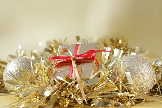 Christmas gift and decorations in gold tinsel