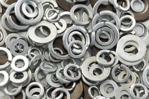 A pile of washers of different sizes background image