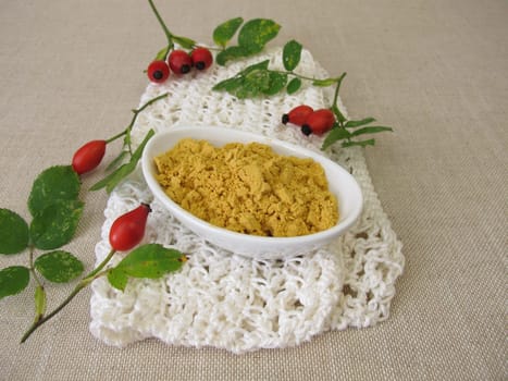 Rose hip powder from the red rose hips of the wild rose