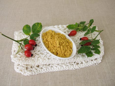 Rose hip powder from the red rose hips of the wild rose