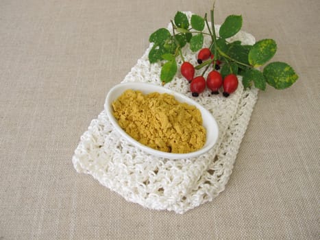 Rose hip powder from the red rose hips of the wild rose