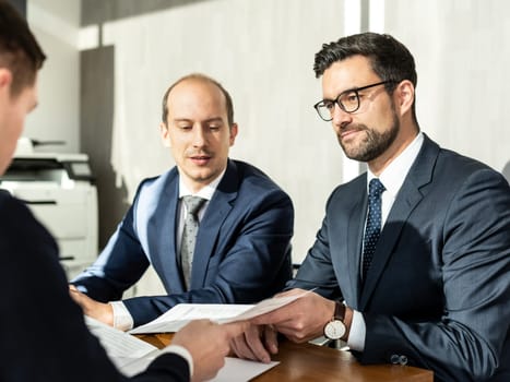 Close-up Of Businessperson Signing Contract,woman writing paper at the desk with pen and reading books at table with basic business Form document working in office