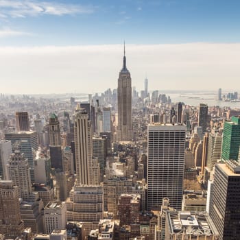 Panoramic view of building and skyscrapers in Midtown and downtown skyline of lower Manhattan, New York City, USA.