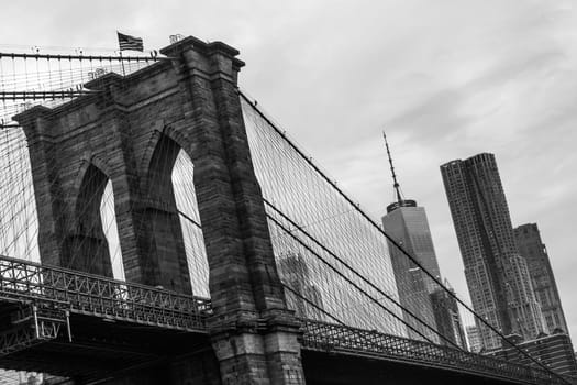Brooklyn Bridge and Manhattan skyline in black and white, New York City, USA.