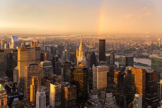 New York City skyline with Manhattan skyscrapers at dramatic vibrant after the storm sunset, USA
