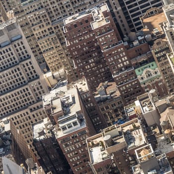 New York City, USA. Midtown Manhattan building rooftops with steam comming from the heating systems.