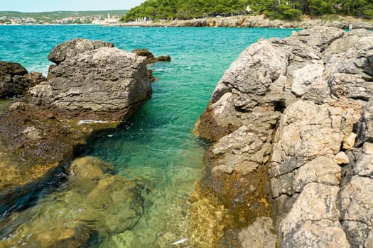Rocky coast of the Adriatic Sea on the island of Krk near the town of the same name Krk in Croatia