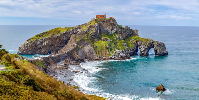 Great panoramic view of the Chapel San Juan de Gazteluatxe located on a rocky peninsula in Basque country, Spain