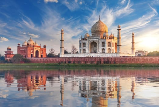 Taj Mahal at sunset, back view from the Yamuna river, Agra, India.
