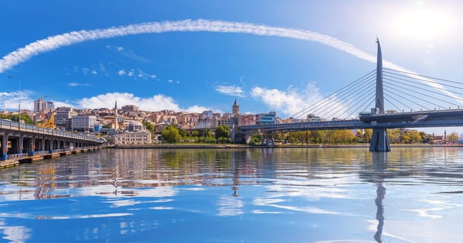 Bridges of Istanbul and Galata Tower on the background, view from the Golden Horn, Turkey.