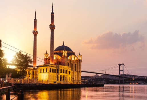 The Ortakoy Mosque and Bosphorus bridge at sunrise, Istanbul.