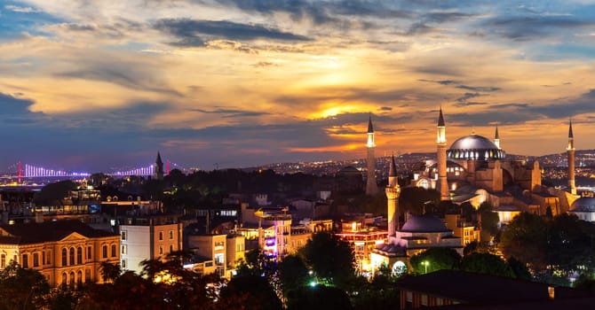 Istanbul sunset panorama with Bosphorus Bridge and Hagia Sophia Mosque, Turkey.