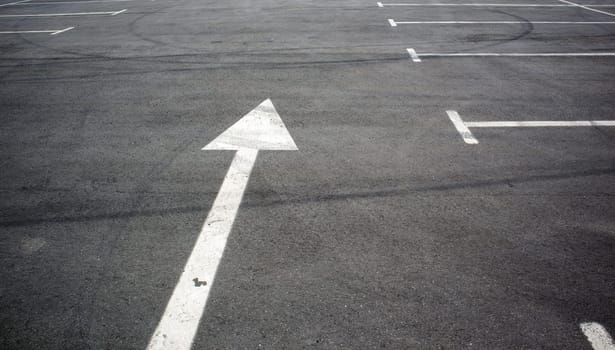 Parking kiosks in the parking lot, marked with white lines. Empty parking lot. Outdoor car park with freshly painted kiosk lines. Outdoor parking on an asphalt road