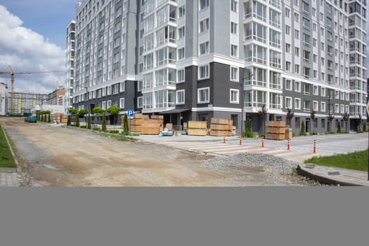 European modern residential complex. New apartment building, new building. New block of modern apartments with balconies. Construction of a residential residential complex