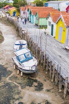 Colorful cabins on the harbor of Château d'Oléron, on the island of Oléron in France