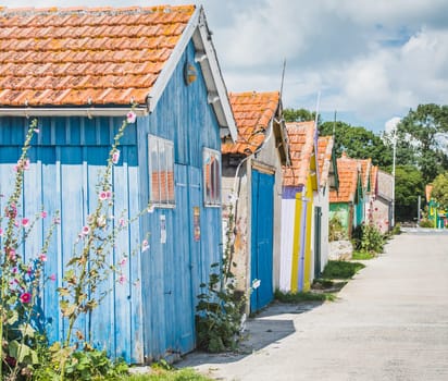 Colorful cabins on the harbor of Château d'Oléron, on the island of Oléron in France