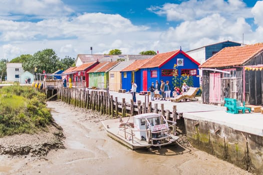 Colorful cabins on the harbor of Château d'Oléron, on the island of Oléron in France