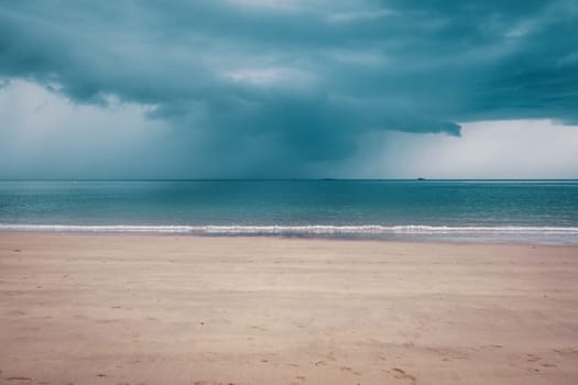 Unsettled dark sky over the beach in Brittany, France