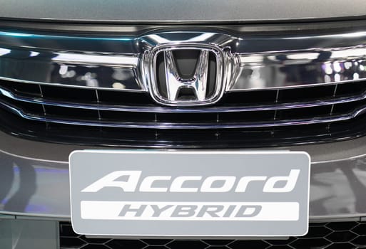 Saraburi Thailand - April 8 , 2018 : Selected focused of Honda commercial brand emblem and logos Accord Hybrid at the car showroom