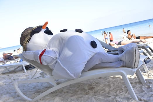 Snowman mascot at the Caribbean beach detail