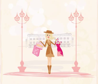 beautiful blonde girl doing shopping in the city