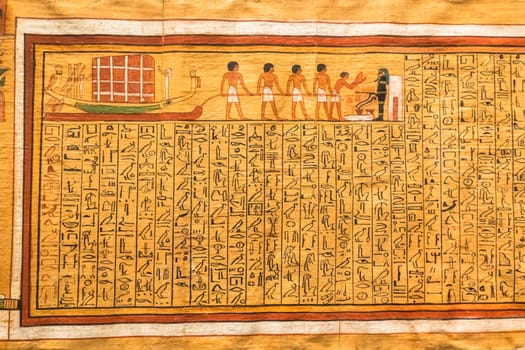TURIN, ITALY - CIRCA MAY 2021: ancient Egyptian papyrus with hieroglyphic funerary text. Circa 1550 BC antique manuscript.