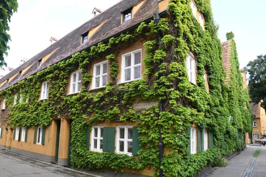 The Fuggerei in Augsburg was donated by Jakob Fugger in 1521. The row house settlement is the oldest existing social housing estate in the world. She celebrated her 500th birthday in 2021
