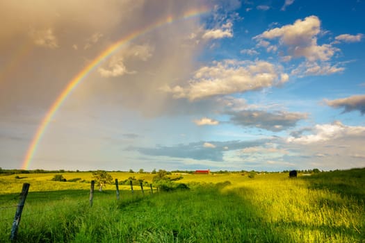 Scenic view of Central Kentucky countryside with double rainbow after storm