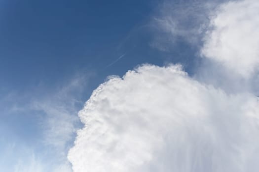 White and gray clouds with blue sky background. Copy space.