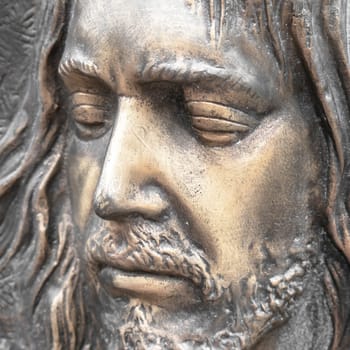 Face of jesus. Ancient sculpture. Bronze statue of the face of jesus. Ideal for concepts or events like Easter.