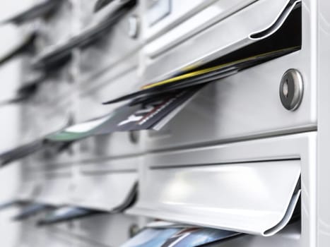 New mailboxes filled of leaflets. Business and advertising concepts. Shallow dof.