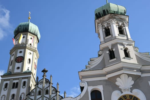 The Roman Catholic Basilica Zum Heiligen St. Ulrich is a pilgrimage church in Augsburg,Germany. Built in the Gothic and Late Gothic style. The spiers are onion-shaped. Construction began in 1474.
