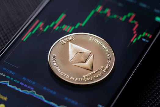 Ethereum cryptocurrency trading on smartphone close up