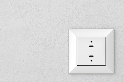 Wall socket with two USB-C ports for charging various types of electronic devices