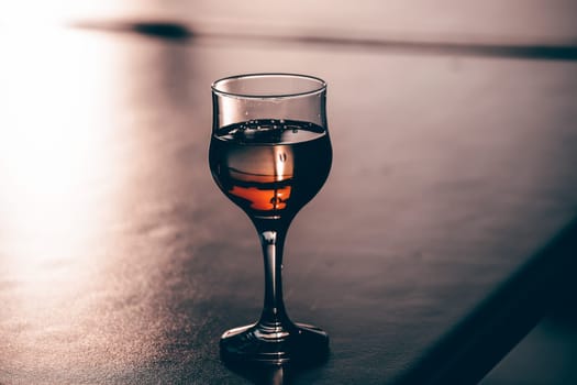 Wine tasting experience at the wine bar: red wine on the table.