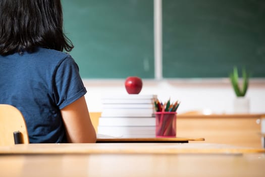 Back to school concept: studens in the classroom at the begining of the new school season.