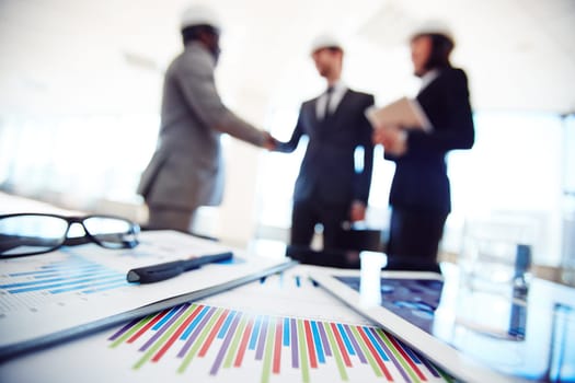 Business documents and touchpad in working environment