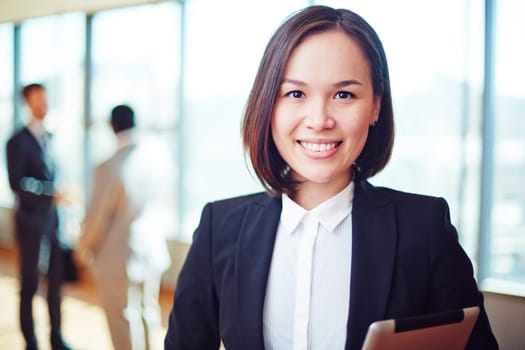 Female business leader looking at camera