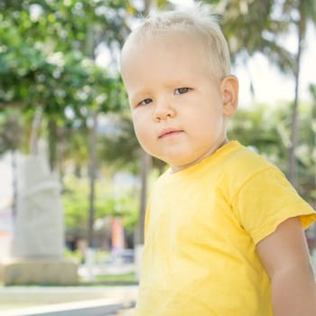 Outdoor portrait of the cute baby