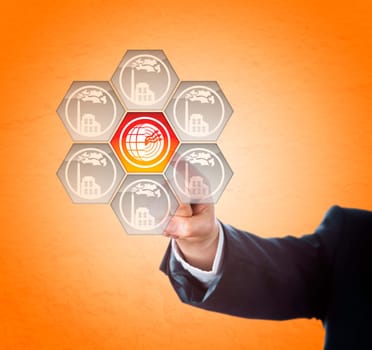 Geothermal power button is activated by touch. Arm of a business executive is reaching towards the touch screen interface. Smoking factory icons remain grey. Technology metaphor for energy transition.