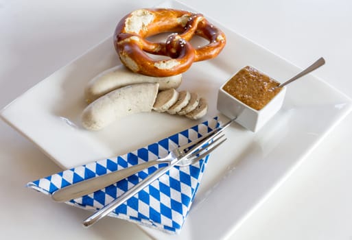 White sausage and pretzels