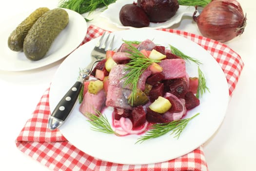Matjessalat with beetroot,onions and sour cucumber