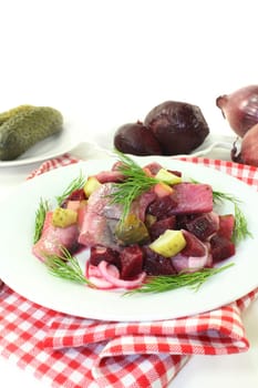 Matjessalat with beetroot,onions and sour cucumber