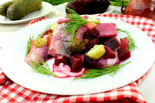 Matjessalat with beetroot,onions and sour cucumber