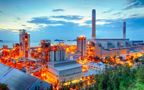 Glow light of petrochemical industry on sunset.