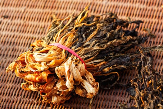Chinese dried white cabbage on bamboo background