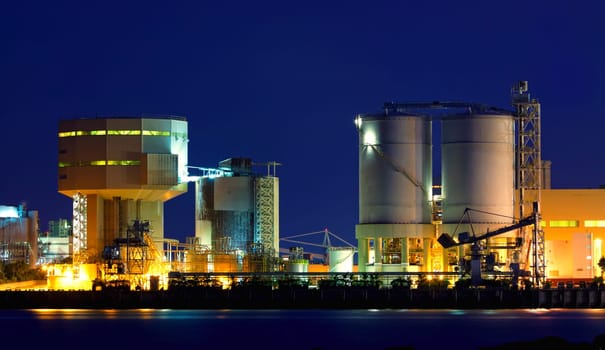 power station at night with smoke , hong kong