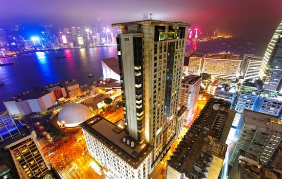 Hong Kong night view of skyline with reflections at victoria harbor