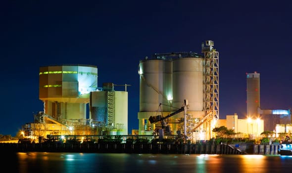 power station at night with smoke , hong kong