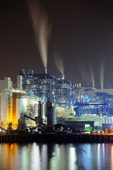 power station at night with smoke, hong kong